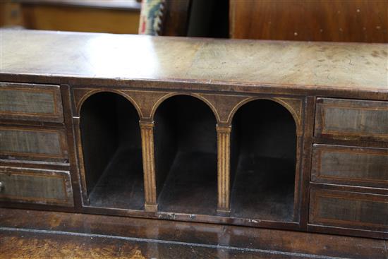 A George III design mahogany, amboyna and boxwood banded Carlton House desk, W.3ft 4.5in